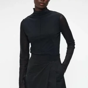 Chandail à col montant et manches transparentes